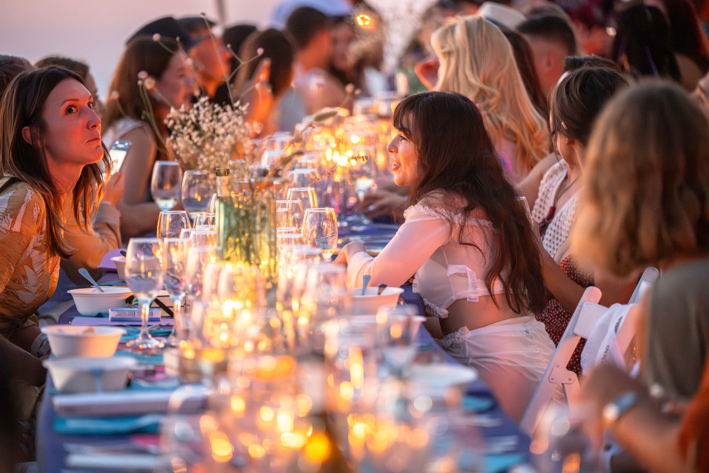 Ritual Dinner table set above the coastline